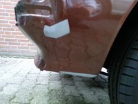scheurtje in de lak door tik tegen de bumper begon te roesten > bijgewerkt en opnieuw gespoten