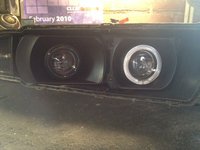 Rechts de nog originele HID projector HID lamp.